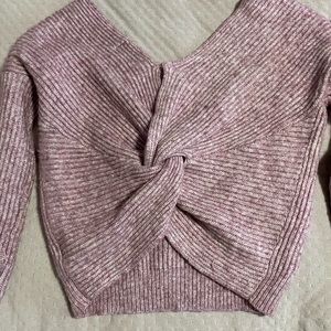 Lovely purple sweater with twisted back design